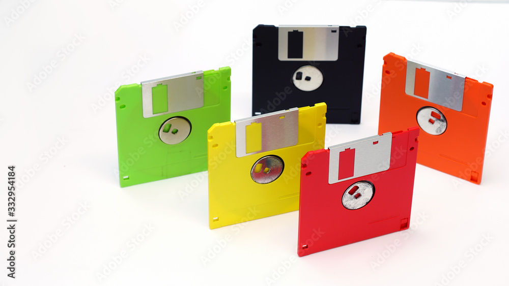 old floppy disk on a white background.Multi-color floppy disk. old floppy disk on a white background.Multi-color floppy disk.