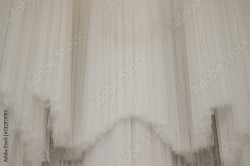 Wedding background decorated with transparent white curtains