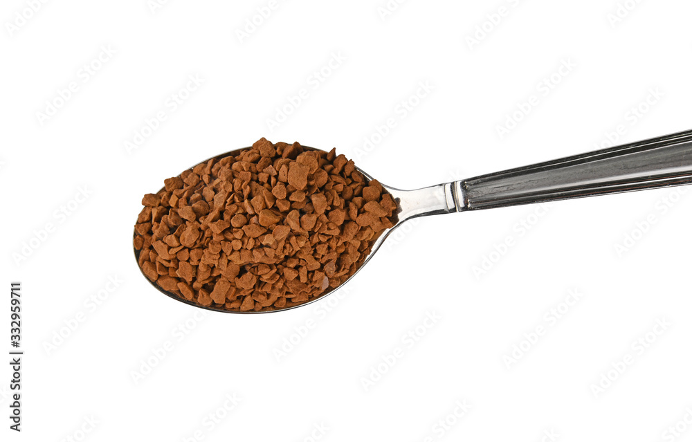 Metal spoon full of freeze dried instant coffee Metal spoon full of freeze dried instant coffee