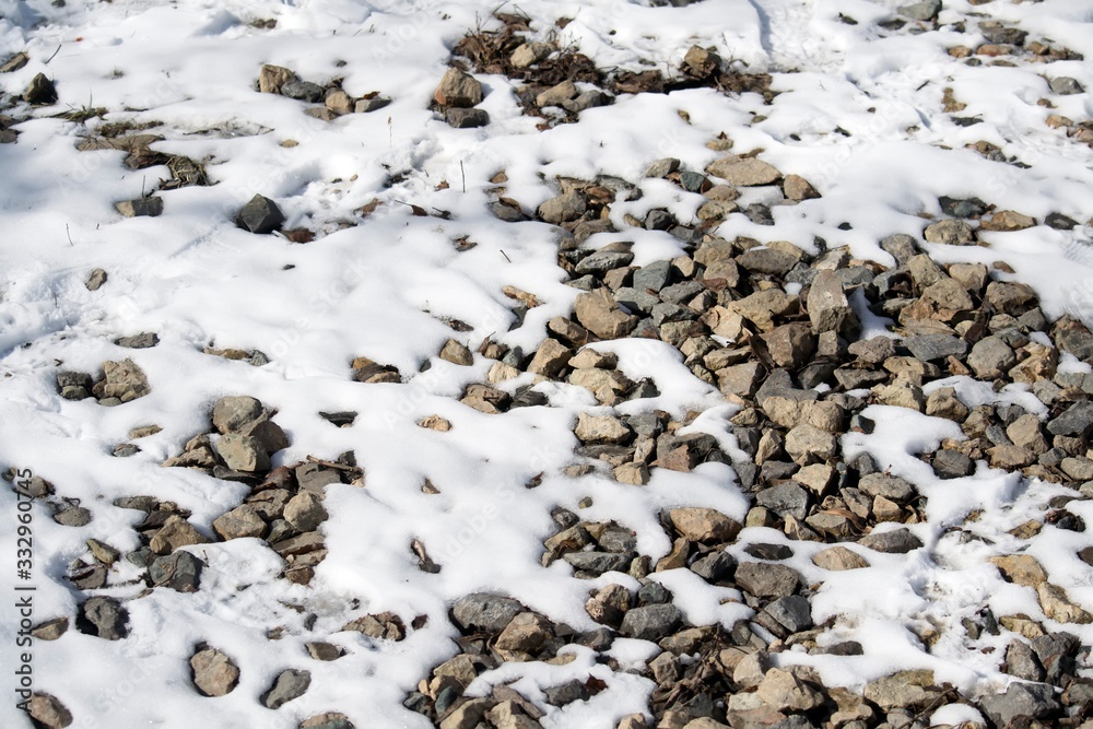 Stones and snow. Background for calendar, presentations, flyers Stones and snow. Background for calendar, presentations, flyers