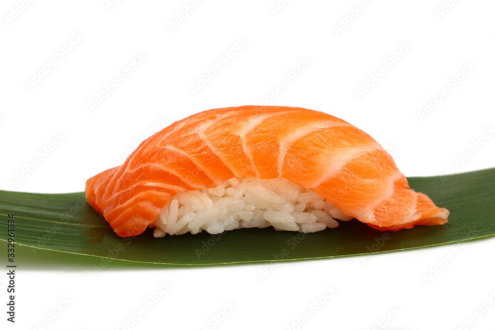 Close up one nigiri sushi with salmon on white Close up one nigiri sushi with salmon on white