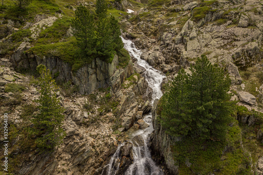 Waterfall of brook in mountains of the French alps