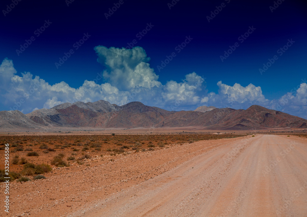 Dust road at the namib desert in Namibia Dust road at the namib desert in Namibia