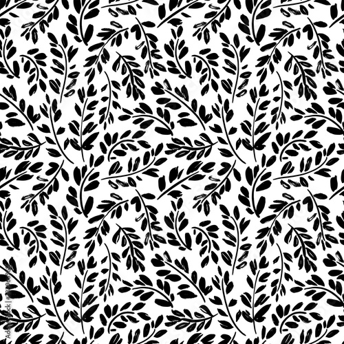 Black paint branches with leaves vector seamless pattern. Grunge dry brush stroke texture. Ink illustration.