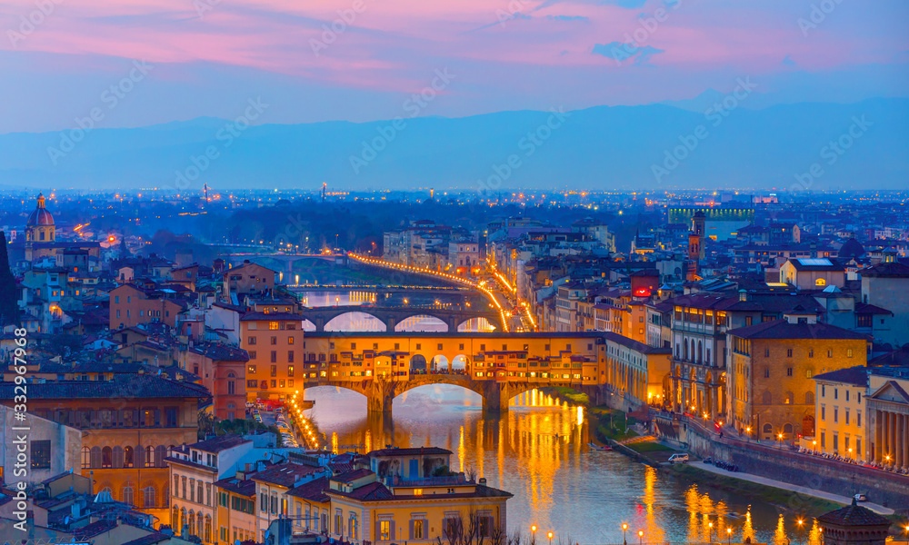 Fototapeta Ponte Vecchio over Arno river at twilight blue hour - Florence, Italy