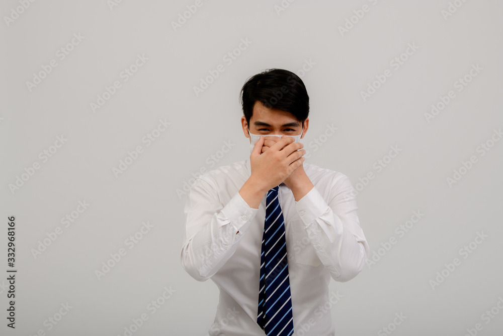 Asian male coughing, sneezing or having a runny nose and fever. Asian men exposed to coronavirus infection, coronavirus concept 2019 Asian male coughing, sneezing or having a runny nose and fever. Asian men exposed to coronavirus infection, coronavirus concept 2019