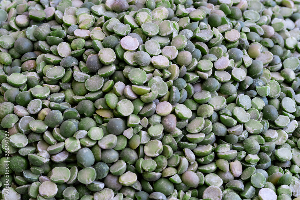 Closeup of row green split peas Closeup of row green split peas