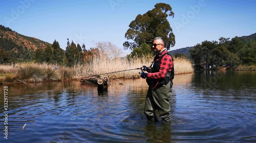 Hisaronu Orhaniye, Marmaris - Mugla / Turkey. March 12, 2020. Fisherman at river in Hisaronu. photo