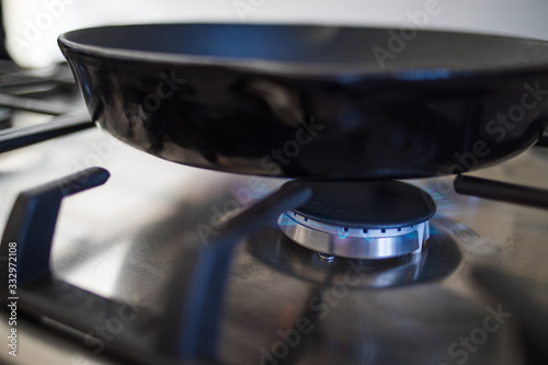 Close up image of a gas burner on a gas stove