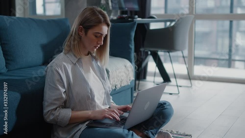 Serious beautiful young woman freelancer work on freelance from modern home typing email on laptop focused girl use computer for study online female user busy on distance internet job