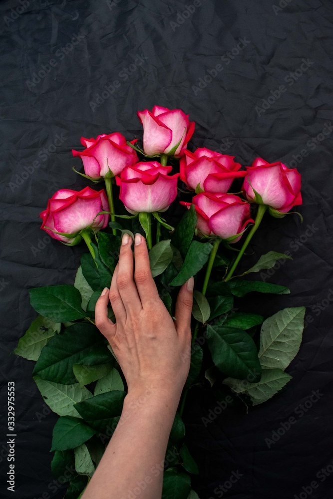 bouquet of red roses in hand bouquet of red roses in hand