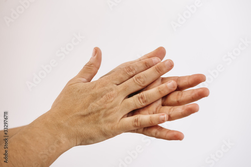 rubbing hands isolated on white background
