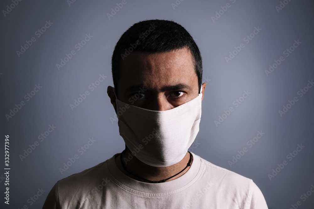 portrait of a man with protective medical mask portrait of a man with protective medical mask