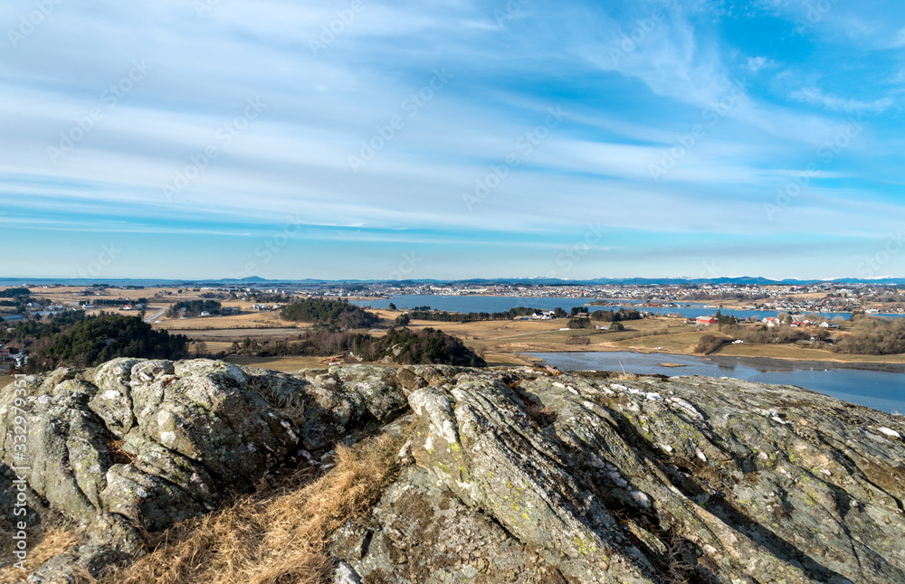 Spring landscape view of Hafrsfjord fjord and its coastline from Tananger suburb, Stavanger, Norway, March 2018