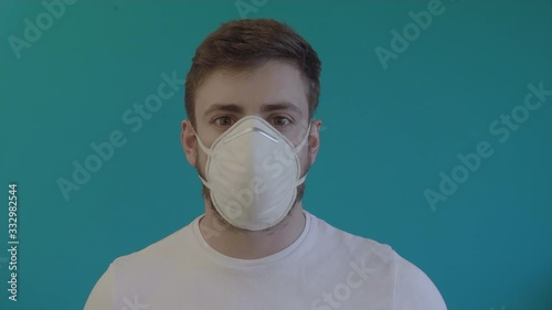 Young Man Putting Protective Mask for Prevention Against Coronavirus Pandemic 3