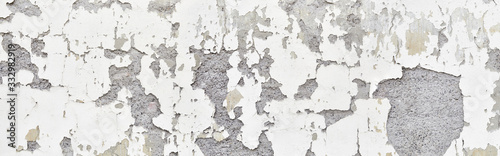 Detail of a chipped facade plaster on an old farmhouse. Left side. Can be combined into a large panorama.