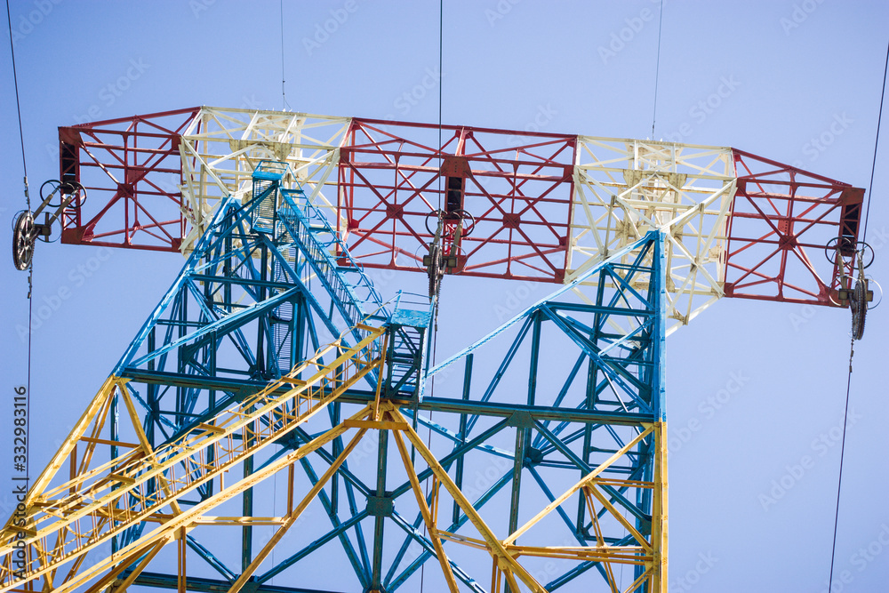 High voltage electric power transmission tower, a concept of green energy and environmental conservation (view from beneath)