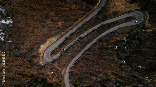 Deep valley road in the evening mist