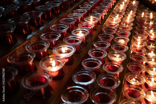 red and yellow candles in the church photo