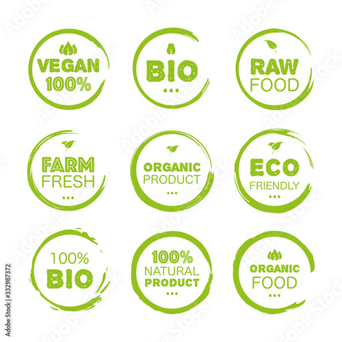 Fresh healthy organic vegan food set linear grunge logo labels and tags the different design and green color. Vector hand drawn objects
