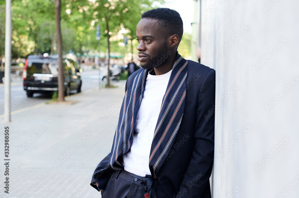 Ethnic afro businessman waiting street. Ethnic afro businessman waiting street.