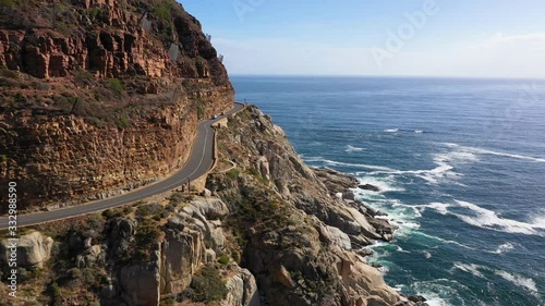 road next to a beautiful rocky coast