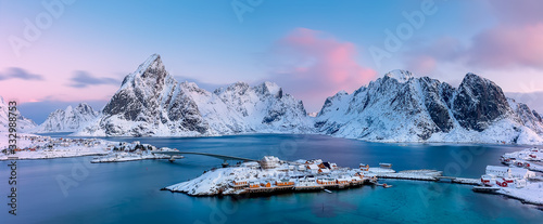 Fotografie, Obraz Panoramic view from above to Sakrisøya Island with mountains on background at sunrise - Lofoten Islands, Norway