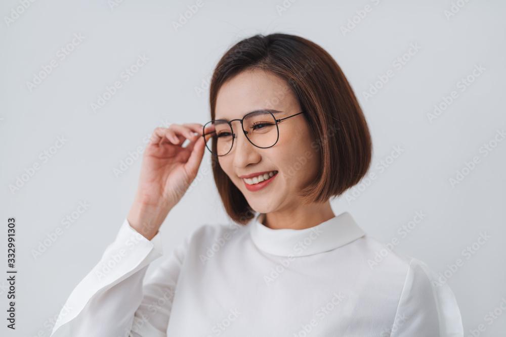 Shot of attractive cheerful asian woman feeling happy Shot of attractive cheerful asian woman feeling happy
