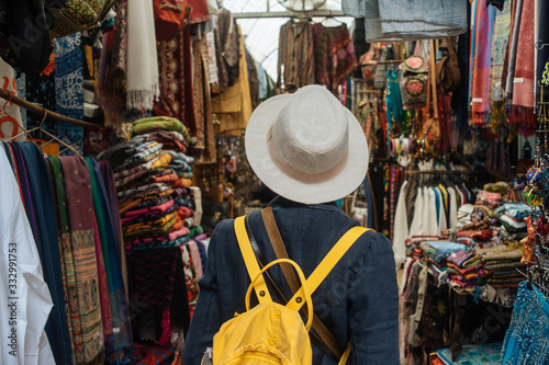 Unrecognizable woman in market photo