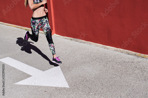 Crop sportswoman urban running sprint.