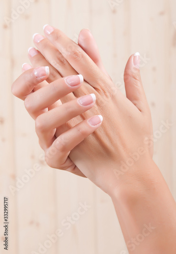 very well-groomed woman's hands in a skin treatment in a spa