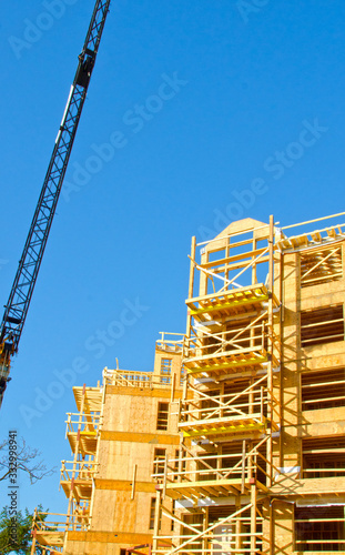 Apartment Condominium Complex, Wood Frame Construction, Victoria, Canada.  Blue Sky background