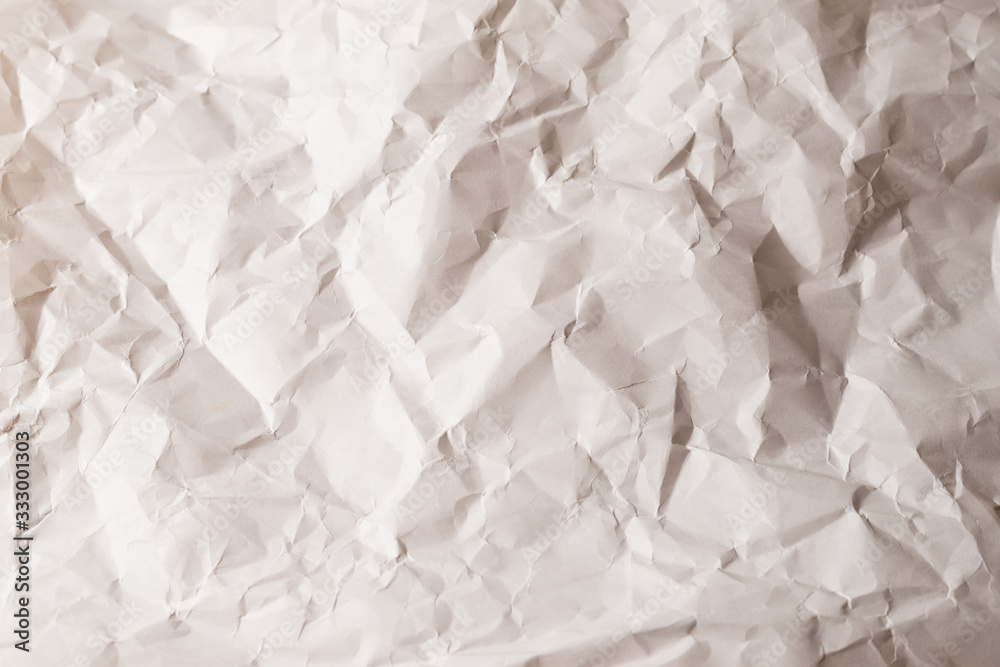 Obraz premium Crumpled white paper background.