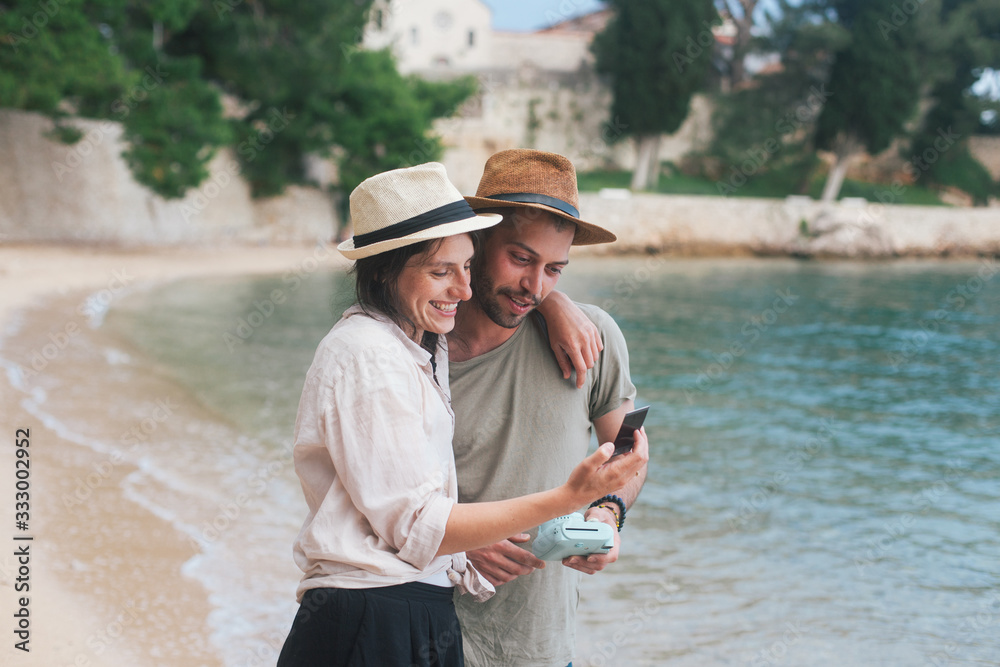 Young couple spending time at the beach Young couple spending time at the beach