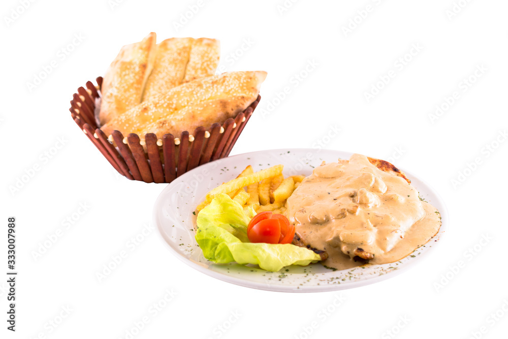 Chicken in a creamy sauce with mushrooms and french fries. Photo taken on a white background. Dish of Balkan cuisine. Suitable for restaurant menu. Chicken in a creamy sauce with mushrooms and french fries. Photo taken on a white background. Dish of Balkan cuisine. Suitable for restaurant menu.