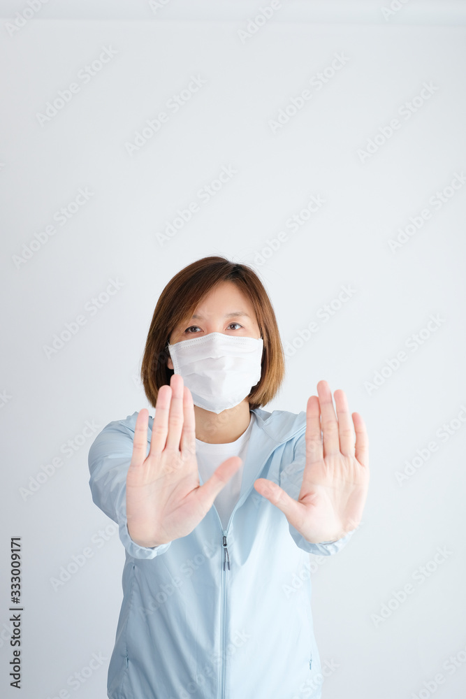 woman wearing mask get sick from corona virus, covid19 and flu. pray and cheer up for stay strong and get well.self quarantine and safer at home with hope and do tai chi. woman wearing mask get sick from corona virus, covid19 and flu. pray and cheer up for stay strong and get well.self quarantine and safer at home with hope and do tai chi.