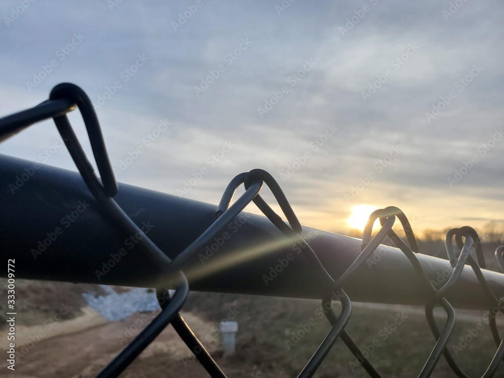 fence in the sunset