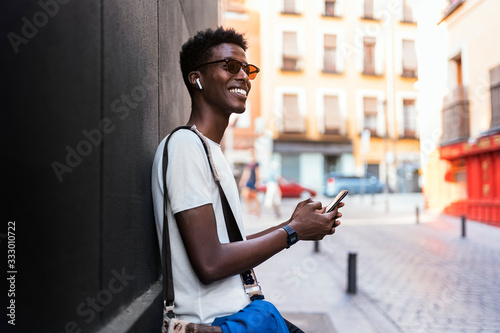 African man using mobile phone photo