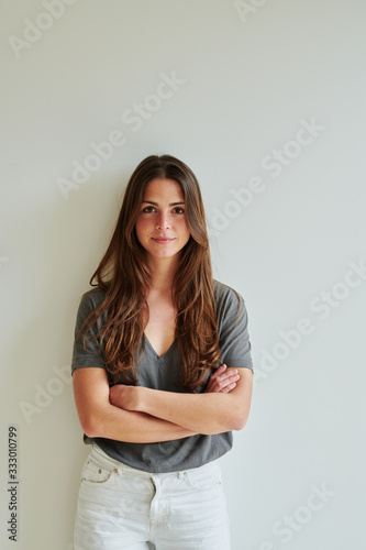 Portrait of pretty brunette woman with long hair.