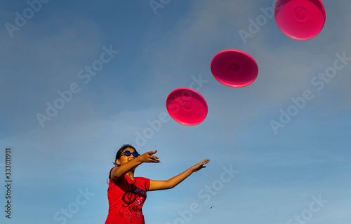 Teenage Girl Playing With Frisbee photo