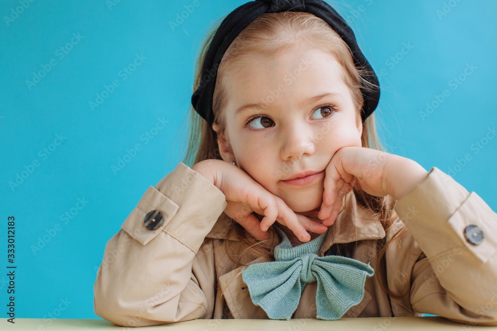 © Liliya Rodnikova/Stocksy - Studio portrait of cute little girl