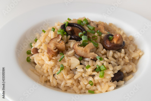 Risotto with funghi and .chopped chives