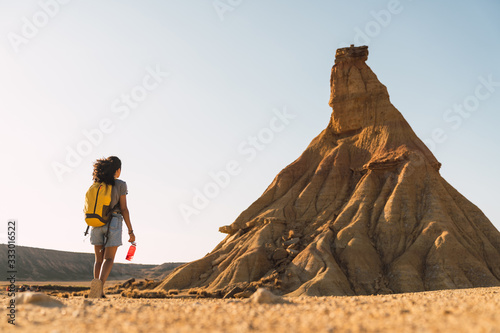 rear view of a woman arriving at her destination, the castil de tierra peak photo