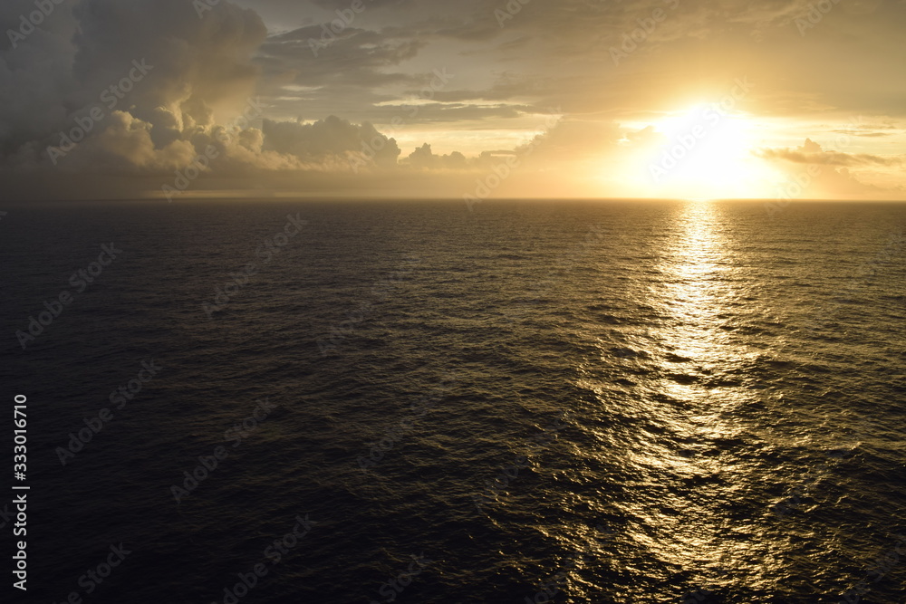 Naklejka premium Sunrise Over the Sea