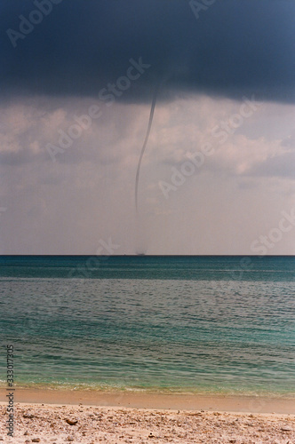 Waterspout - tornado in the ocean photo