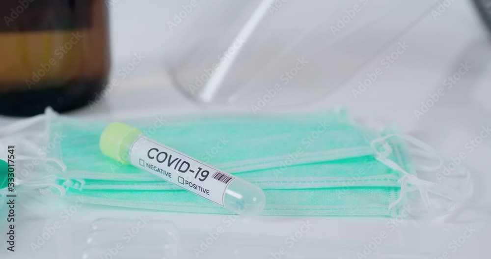 Close-up medical laboratory table with empty blood samples tube for coronavirus Covid-19 (2019-nCoV) shot in 4k super slow motion Close-up medical laboratory table with empty blood samples tube for coronavirus Covid-19 (2019-nCoV) shot in 4k super slow motion