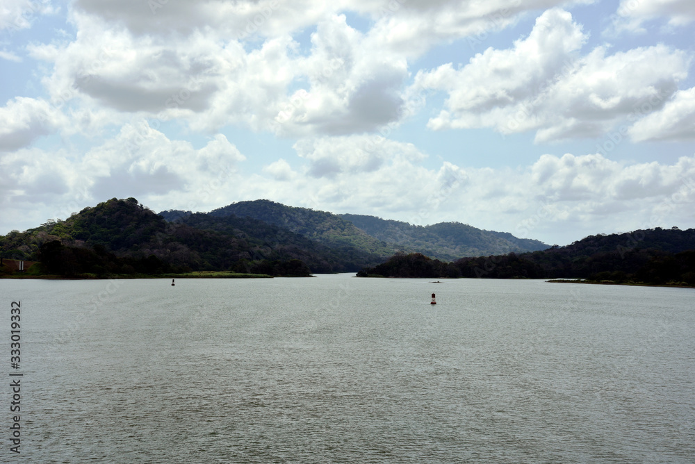 Landscape of Panama Canal, view from the transiting cargo ship.