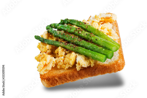 Scrambled egg asparagus sandwich on a white isolated background