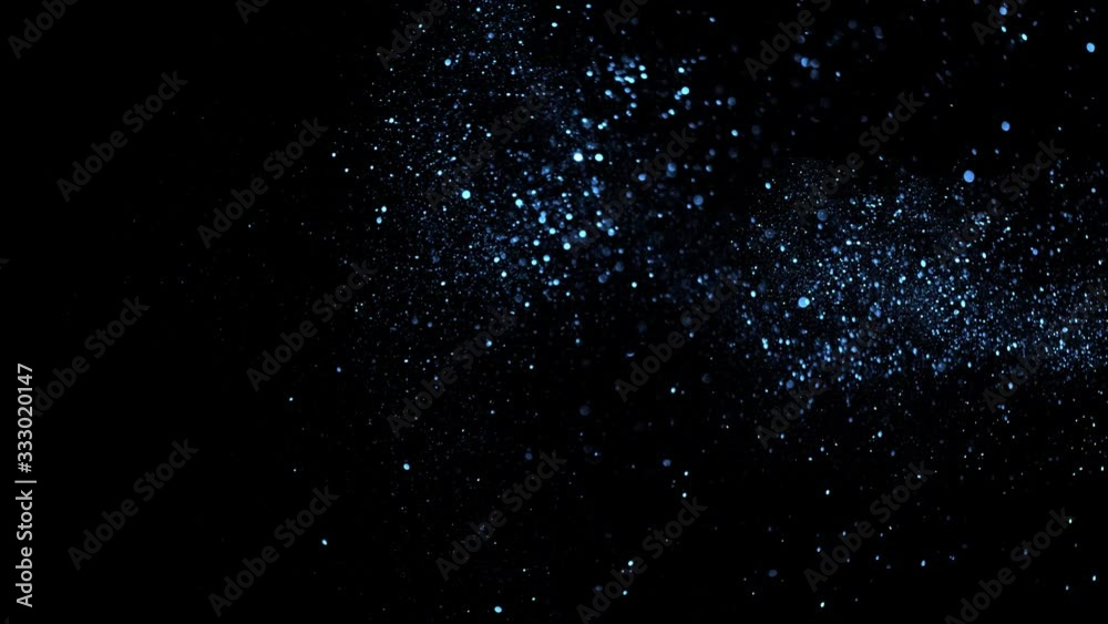 silver rain on a black background . Golden Particles ( glitters background ) . loop 4K 3840X2160 UHD video. Macro view. silver rain on a black background . Golden Particles ( glitters background ) . loop 4K 3840X2160 UHD video. Macro view.