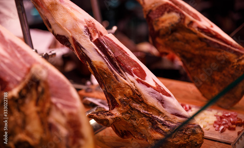 Famous ripened Spanish iberico ham in the Barcelona market
